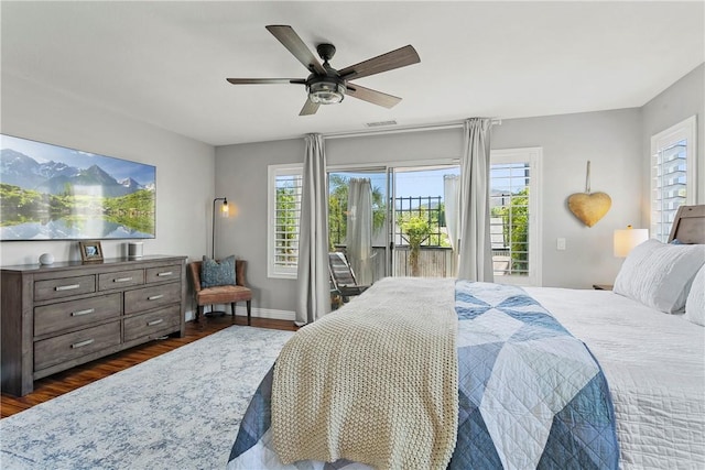 23763 Aspen, Murrieta, CA 92562 - bedroom featuring access to outside, multiple windows, dark wood-style flooring, and a ceiling fan