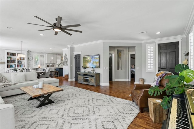 23763 Aspen, Murrieta, CA 92562 - living area featuring a ceiling fan, dark wood-type flooring, crown molding, and recessed lighting