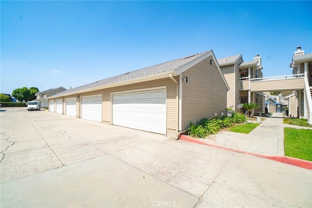 1867 W Falmouth Ave Unit 60, Anaheim, CA 92801 - view of home's exterior featuring community garages