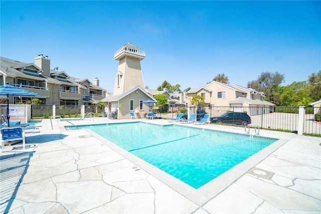 1867 W Falmouth Ave Unit 60, Anaheim, CA 92801 - community pool featuring a residential view and a patio