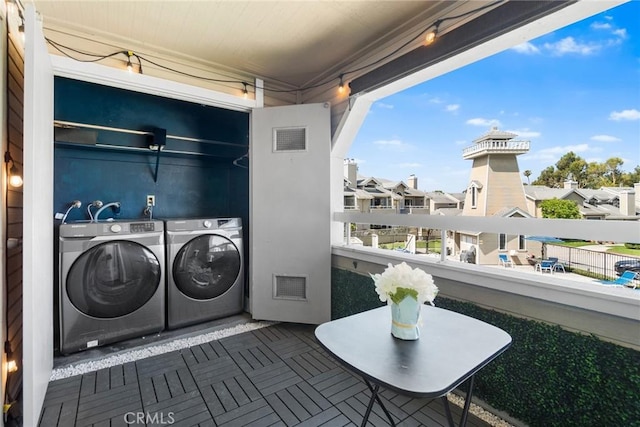 1867 W Falmouth Ave Unit 60, Anaheim, CA 92801 - balcony with washer and clothes dryer and a residential view