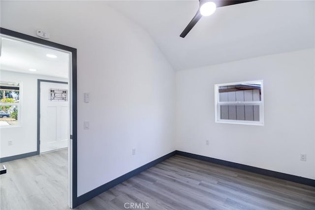 1235 Spruce St, San Bernardino, CA 92411 - spare room featuring ceiling fan, vaulted ceiling, wood finished floors, and recessed lighting