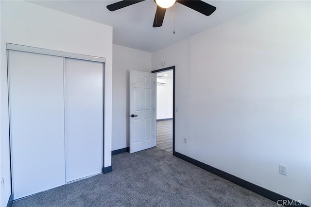 1235 Spruce St, San Bernardino, CA 92411 - unfurnished bedroom with carpet flooring, a closet, a ceiling fan, and an AC wall unit