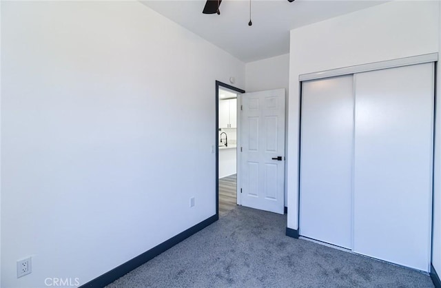 1235 Spruce St, San Bernardino, CA 92411 - unfurnished bedroom with carpet floors, a closet, and a ceiling fan