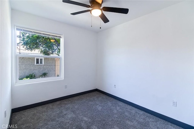 1235 Spruce St, San Bernardino, CA 92411 - carpeted spare room with baseboards and a ceiling fan