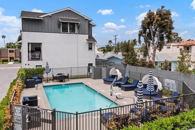 800 Grand Ave Unit 105, Carlsbad, CA 92008 - community pool featuring a patio and outdoor lounge area