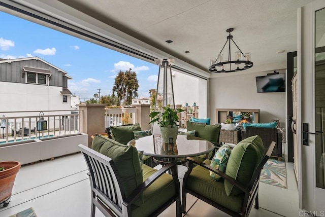 800 Grand Ave Unit 105, Carlsbad, CA 92008 - dining space featuring a chandelier
