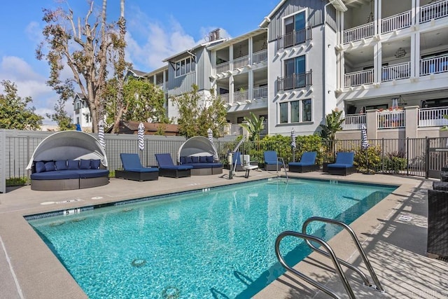 800 Grand Ave Unit 105, Carlsbad, CA 92008 - community pool featuring a patio area and an outdoor living space