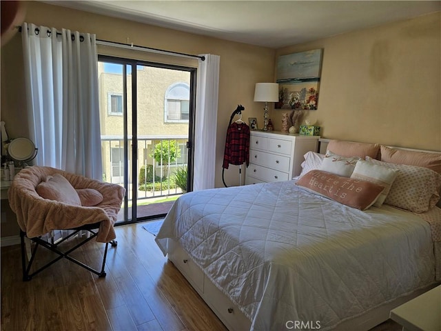 13171 Newland St Unit 11, Garden Grove, CA 92844 - bedroom featuring access to outside and wood finished floors