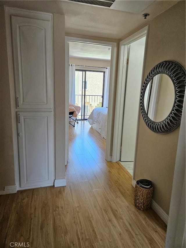 13171 Newland St Unit 11, Garden Grove, CA 92844 - hall with light wood-style floors and baseboards