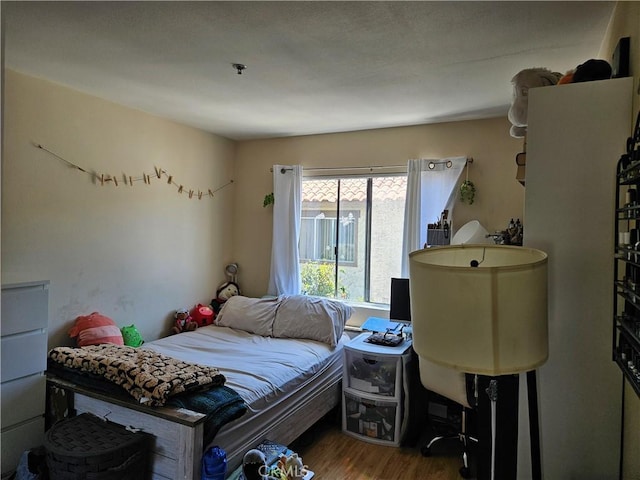 13171 Newland St Unit 11, Garden Grove, CA 92844 - bedroom with wood finished floors