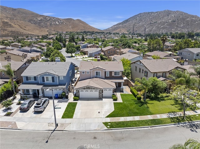 17129 Lacebark St, Fontana, CA 92337 - aerial view of residential area featuring a mountainous background