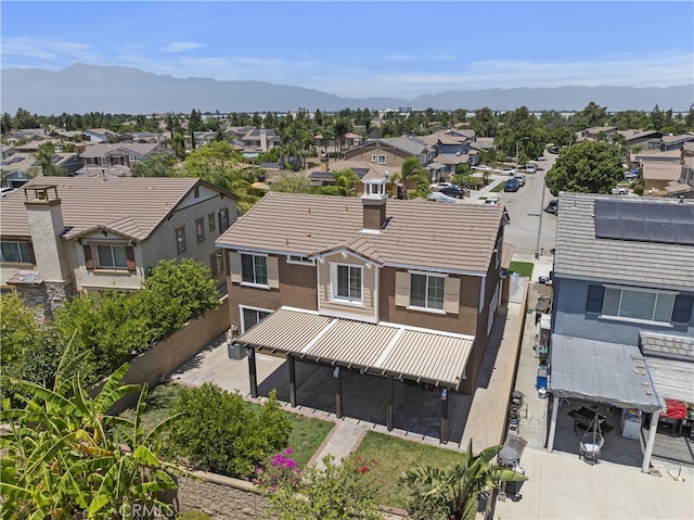 17129 Lacebark St, Fontana, CA 92337 - aerial perspective of suburban area featuring a mountainous background