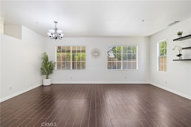 17129 Lacebark St, Fontana, CA 92337 - unfurnished living room with a chandelier and dark wood-type flooring