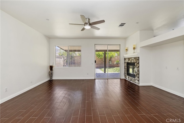 17129 Lacebark St, Fontana, CA 92337 - unfurnished living room featuring ceiling fan, wood finished floors, and a fireplace