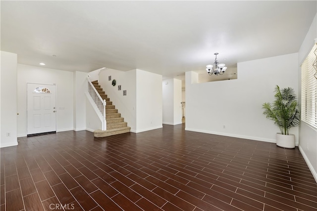17129 Lacebark St, Fontana, CA 92337 - unfurnished living room with a chandelier, stairway, and recessed lighting