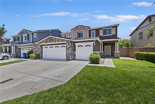 17129 Lacebark St, Fontana, CA 92337 - townhome / multi-family property featuring stone siding, concrete driveway, stucco siding, and a garage