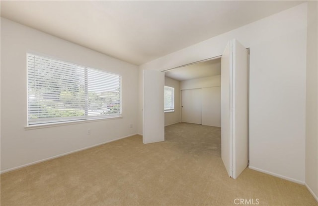 450 Marilyn Ln, Redlands, CA 92373 - spare room featuring light carpet