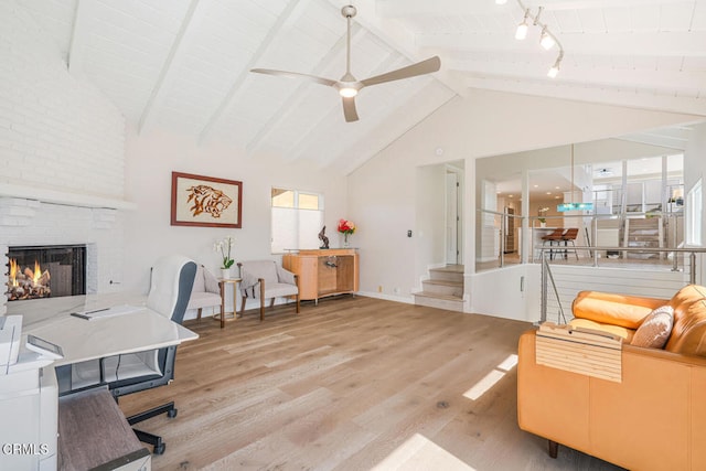 5040 Island View St, Oxnard, CA 93035 - office space with wood finished floors, a fireplace, a ceiling fan, high vaulted ceiling, and a wood ceiling with exposed beams