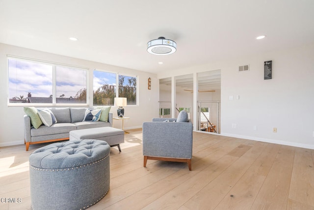 5040 Island View St, Oxnard, CA 93035 - living area with light wood-style floors, recessed lighting, and a ceiling fan