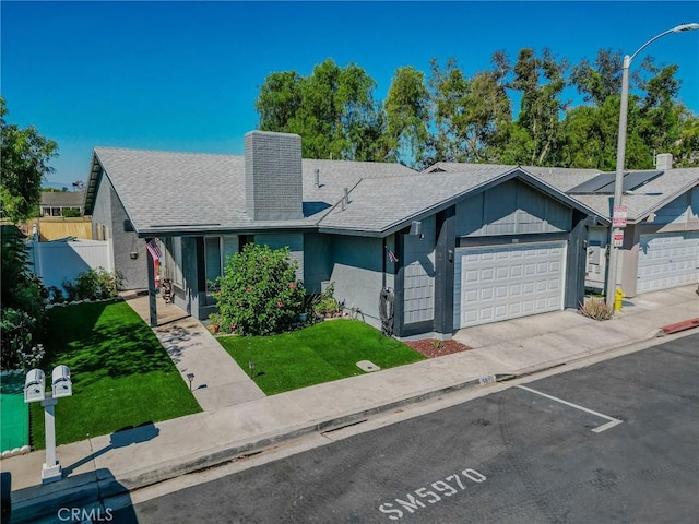 5970 Sky Meadow St, Jurupa Valley, CA 92509 - ranch-style house with a shingled roof and a garage