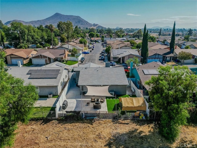 5970 Sky Meadow St, Jurupa Valley, CA 92509 - aerial perspective of suburban area with a mountain backdrop