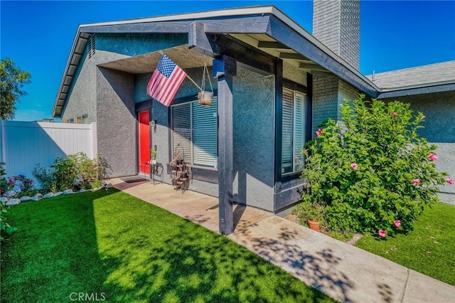 5970 Sky Meadow St, Jurupa Valley, CA 92509 - view of front of property with a chimney and stucco siding