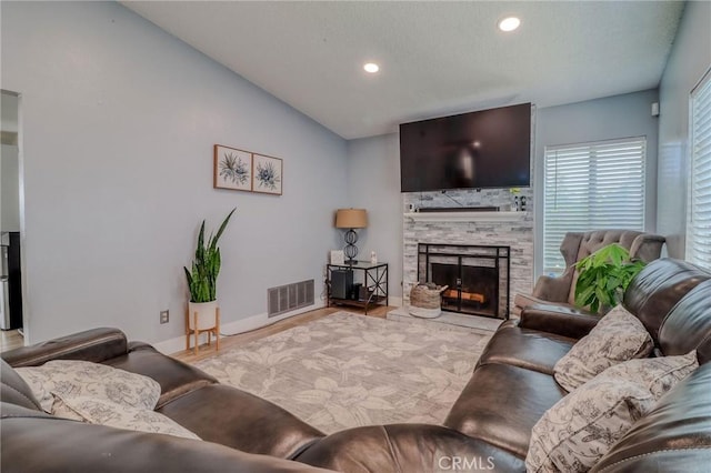 5970 Sky Meadow St, Jurupa Valley, CA 92509 - living area with a fireplace, recessed lighting, wood finished floors, and vaulted ceiling