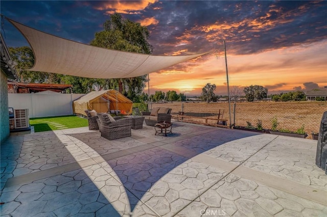 5970 Sky Meadow St, Jurupa Valley, CA 92509 - patio terrace at dusk with a patio and a fenced backyard