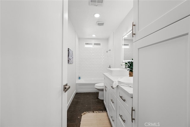 5676 Aztec Ave Unit 29, Palms, CA 92277 - bathroom featuring vanity, tile patterned floors, tub / shower combination, and recessed lighting