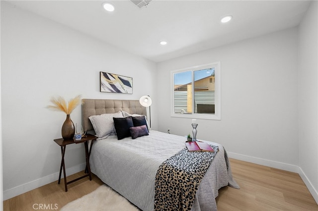 5676 Aztec Ave Unit 29, Palms, CA 92277 - bedroom featuring recessed lighting and light wood-style floors
