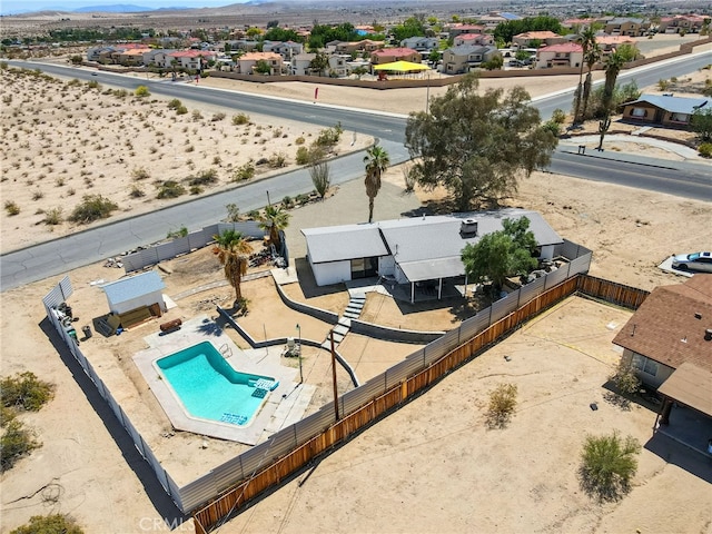 5676 Aztec Ave Unit 29, Palms, CA 92277 - aerial view of residential area featuring a mountain backdrop and a pool