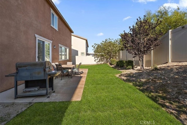 4106 Irish Moss Ln, San Bernardino, CA 92407 - fenced backyard with a patio area