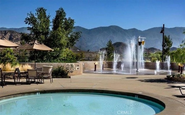 4106 Irish Moss Ln, San Bernardino, CA 92407 - view of swimming pool with a mountain view