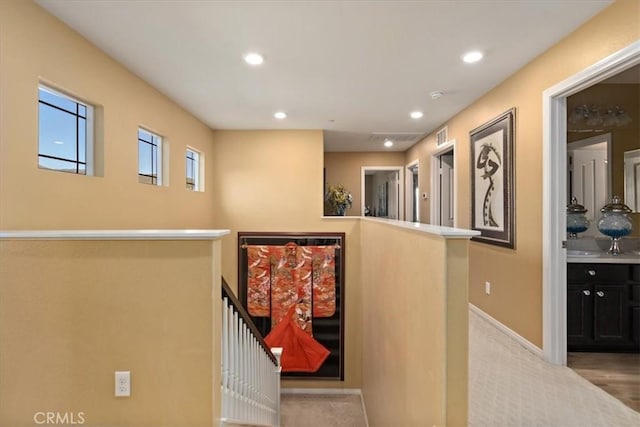 4106 Irish Moss Ln, San Bernardino, CA 92407 - hall featuring an upstairs landing and recessed lighting