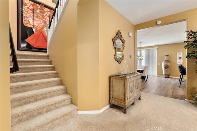 4106 Irish Moss Ln, San Bernardino, CA 92407 - stairs featuring carpet