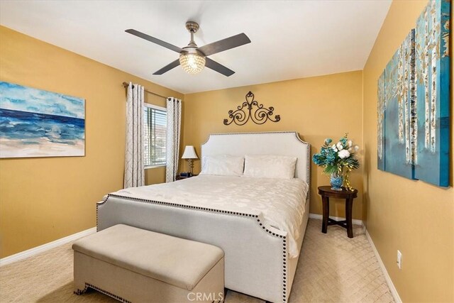 4106 Irish Moss Ln, San Bernardino, CA 92407 - carpeted bedroom featuring baseboards and ceiling fan