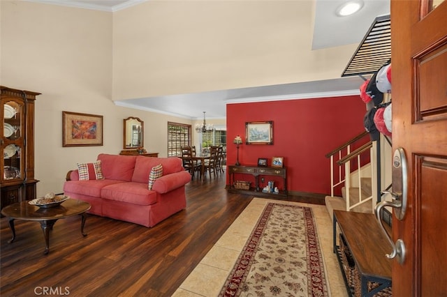 25572 Orchard Rim Ln, Lake Forest, CA 92630 - living room with ornamental molding, a chandelier, stairs, and wood finished floors