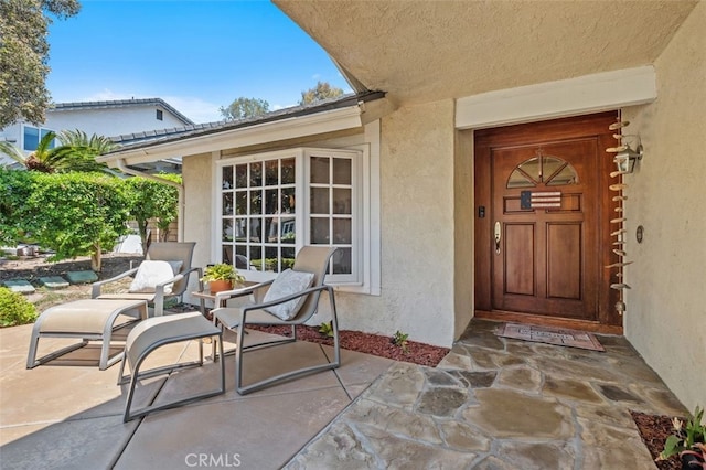 25572 Orchard Rim Ln, Lake Forest, CA 92630 - doorway to property with stucco siding