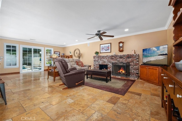 25572 Orchard Rim Ln, Lake Forest, CA 92630 - living room featuring stone tile floors, ceiling fan, a fireplace, ornamental molding, and recessed lighting