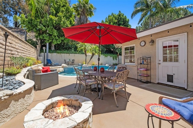 25572 Orchard Rim Ln, Lake Forest, CA 92630 - fenced backyard featuring a fire pit, a patio area, and outdoor dining area