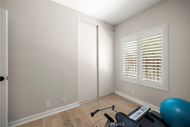 24932 Dove Tree Ln, Lake Forest, CA 92630 - exercise area featuring wood finished floors and baseboards