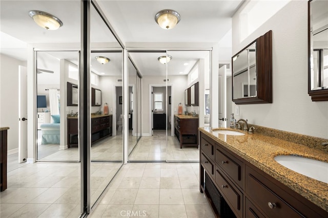 24932 Dove Tree Ln, Lake Forest, CA 92630 - bathroom with double vanity and tile patterned flooring