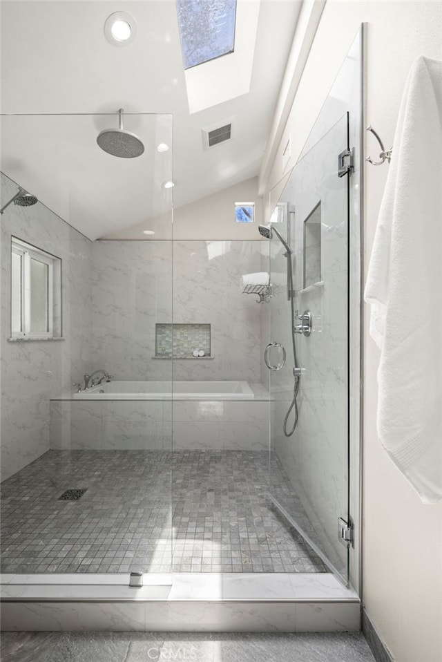 24932 Dove Tree Ln, Lake Forest, CA 92630 - full bathroom with lofted ceiling, a marble finish shower, healthy amount of natural light, a skylight, and recessed lighting