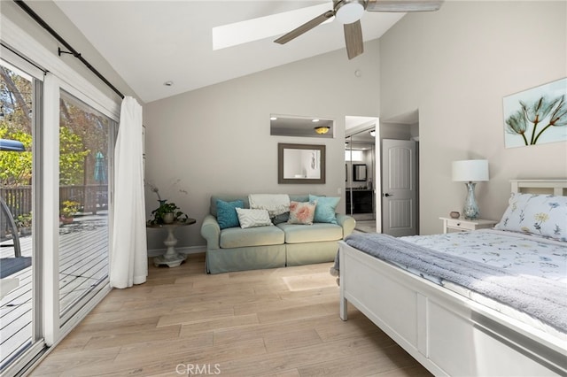 24932 Dove Tree Ln, Lake Forest, CA 92630 - bedroom with access to outside, light wood-style flooring, a skylight, high vaulted ceiling, and ensuite bathroom