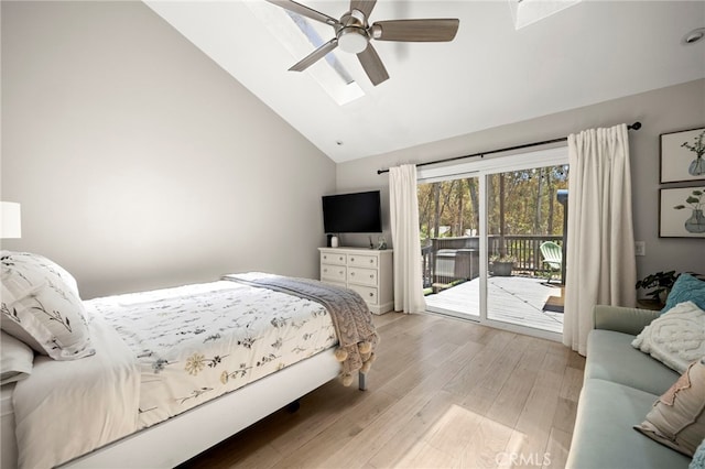 24932 Dove Tree Ln, Lake Forest, CA 92630 - bedroom with access to exterior, high vaulted ceiling, light wood-style flooring, a skylight, and ceiling fan