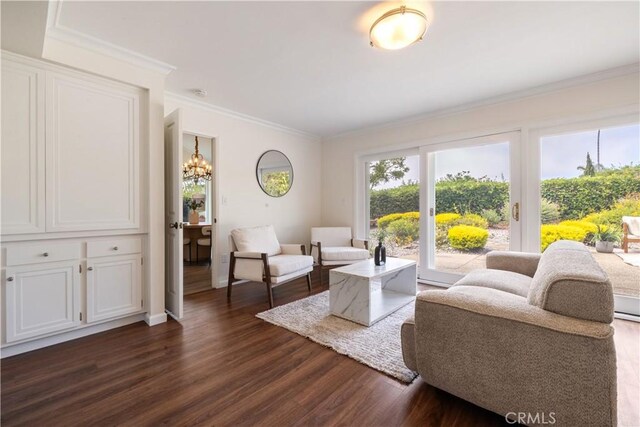6935 Verde Ridge Rd, Rancho Palos Verdes, CA 90275 - living area featuring dark wood-type flooring, crown molding, and a chandelier