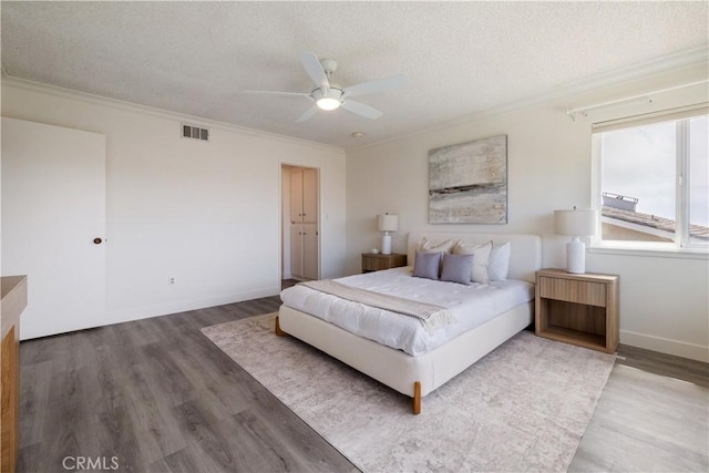 6935 Verde Ridge Rd, Rancho Palos Verdes, CA 90275 - bedroom featuring ornamental molding, wood finished floors, a textured ceiling, and ceiling fan