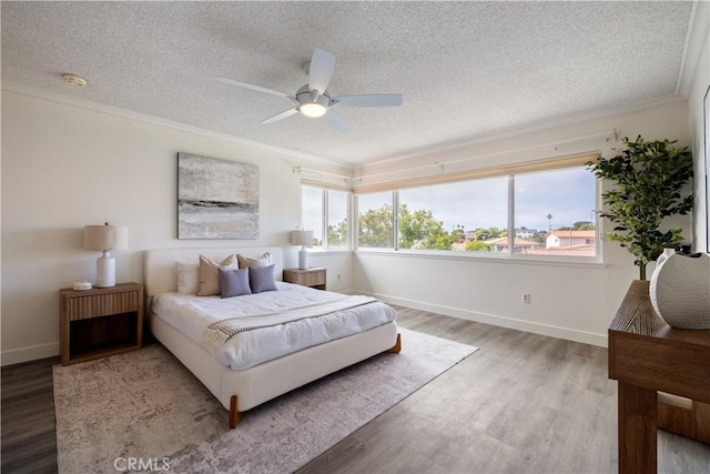 6935 Verde Ridge Rd, Rancho Palos Verdes, CA 90275 - bedroom featuring a textured ceiling, ornamental molding, wood finished floors, and a ceiling fan