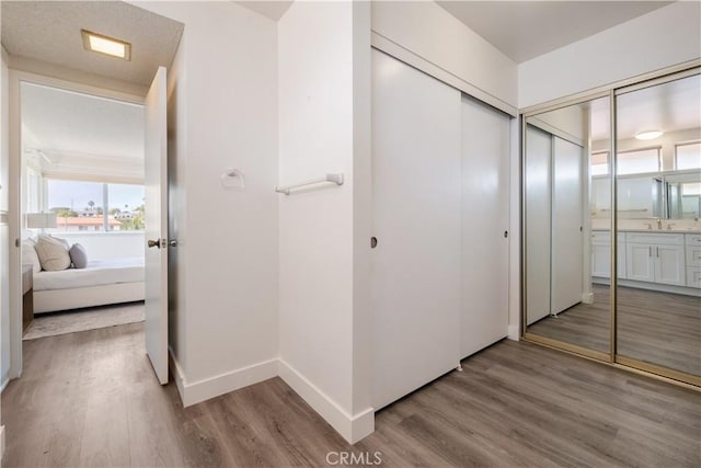 6935 Verde Ridge Rd, Rancho Palos Verdes, CA 90275 - hall featuring wood finished floors and baseboards